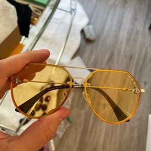 Yellow Gucci sunglasses